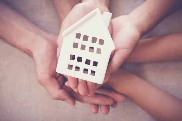 Adult Child Hands Holding Toy House Family Home Homeless Shelter — Stock Photo, Image