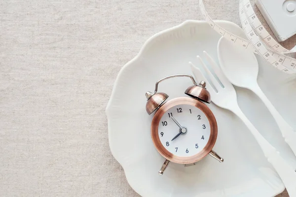 Reloj Placa Cinta Métrica Concepto Dieta Ayuno Intermitente —  Fotos de Stock