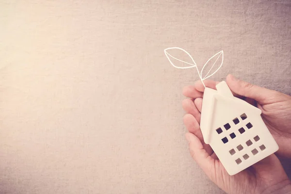 Hands Holding Toy House Family Home Homeless Shelter Concept — Stock Photo, Image