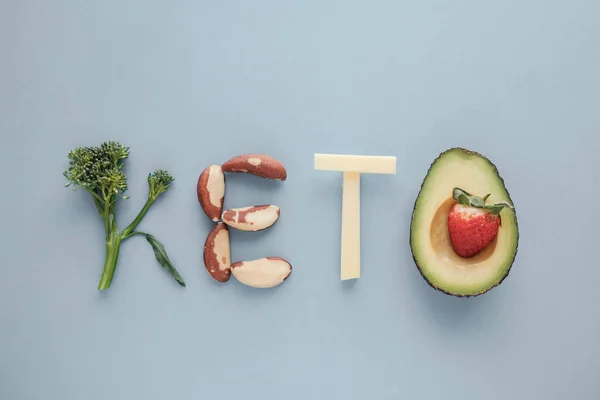 Keto word made from Ketogenic diet, low carb, healthy food on bl — Stock Photo, Image