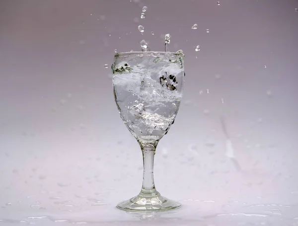 cool drinks and water splash on white background