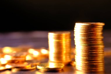 stack of coins on a blurred background 