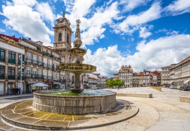 GUIMARAES, PORTUGAL - JUNE 16, 2016: Toural Square (Largo do Toural), in the city center of Guimaraes, Portugal. clipart