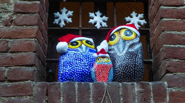 Owls painted by hand on stones