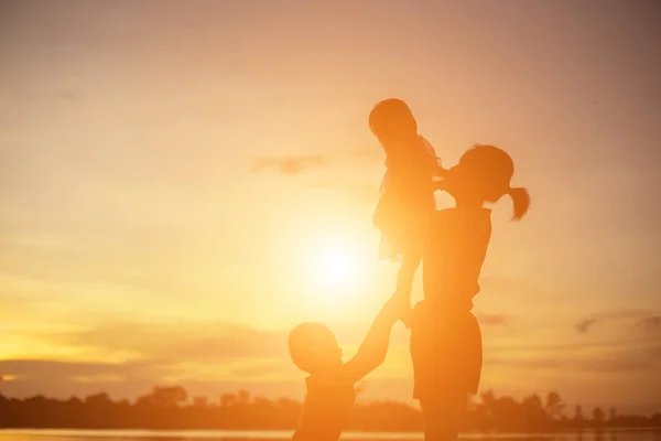 Mother Encouraged Her Son Outdoors Sunset Silhouette Concept — Stock Photo, Image