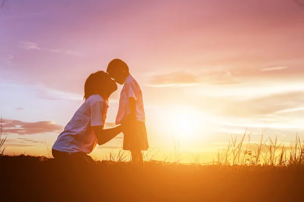 Silhouettes Mother Little Daughter Walking Sunset — Stock Photo, Image