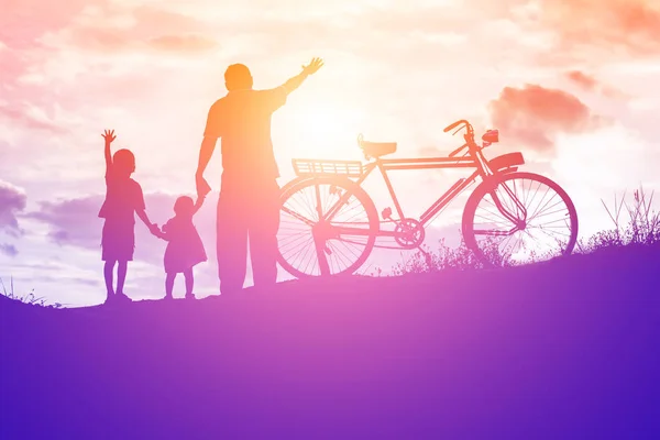 Biker family silhouette father and son