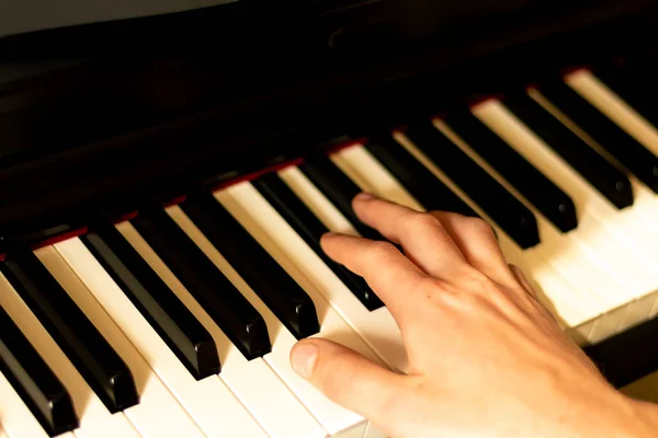 Beautiful piano playing on the piano keys