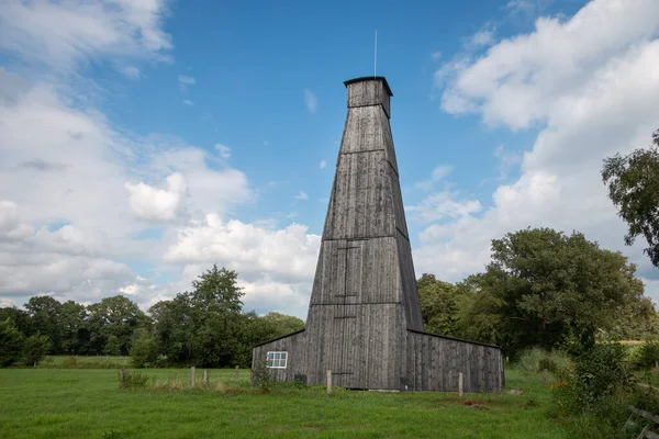 Salt tower containing pipes and valves, near Boekelo, region of Twente in use for the extraction of rock salt from the soil.