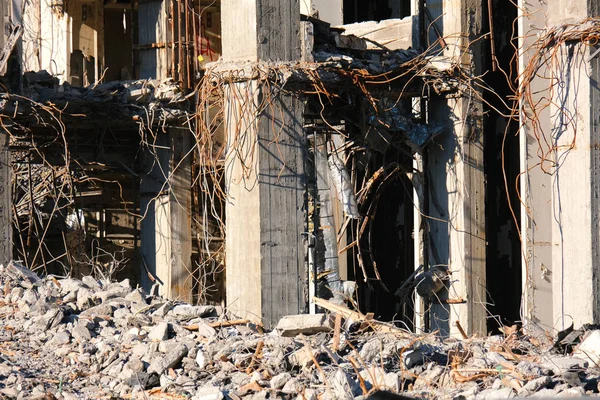 Demolished destructed building ruins.