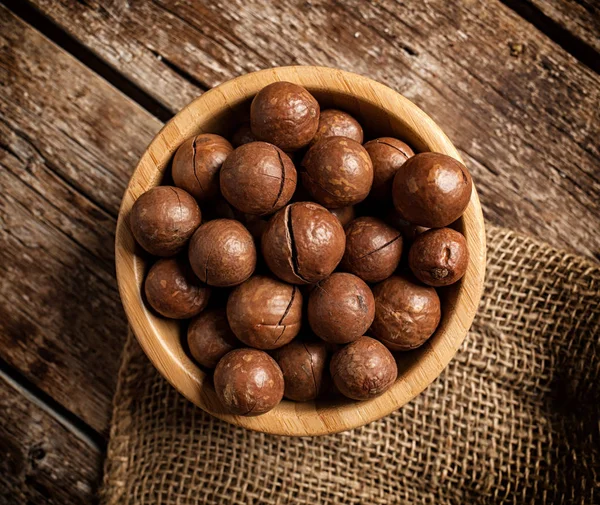 Top View Macadamia Nuts Wooden Table — Stock Photo, Image