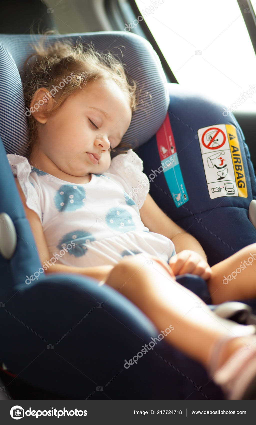 baby sleeping in car seat