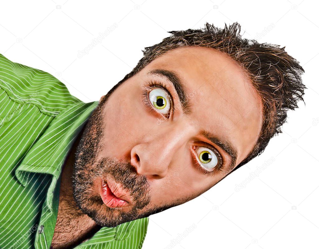 Man with green shirt with surprised expression WOW on white. Dragan effect.