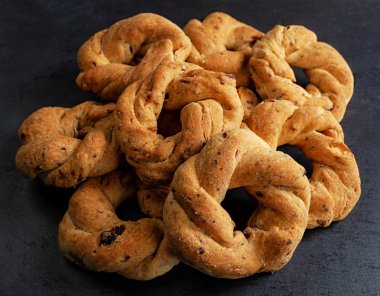 Neapolitan cookies called Taralli. They are made in Naples with pig suet, almonds and black pepper. clipart