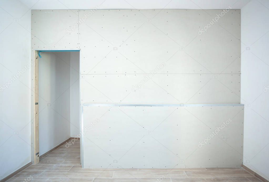 Wall made of plasterboard for a wardrobe in a house.