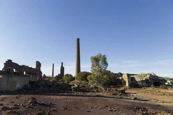 Abandoned chimney in an old coal factory