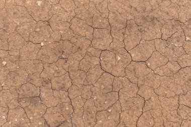 Kırık kirli toprak. Toprak zemin dokusu. Üst görünüm. Küresel ısınma konsepti.