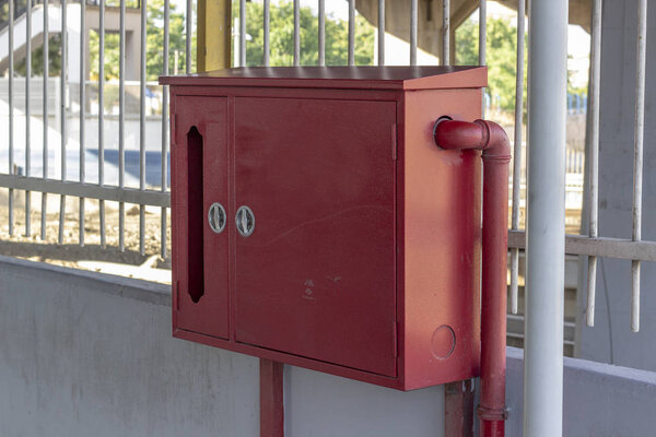 Perspective clean shot of fire emergency box at railway station