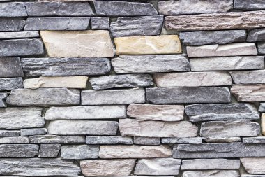 Vurgulanan duvar dikdörtgen renkli taş duvar, Izmir, Türkiye'de geleneksel sıva ile açık yakın çekim çekim