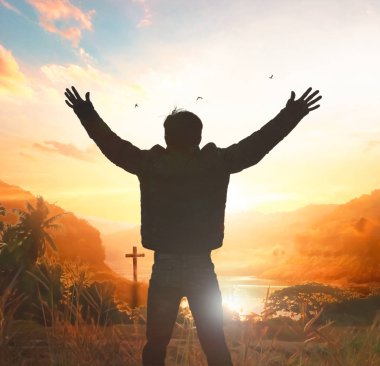 Silhouette of Christian prayers raising hand while praying to the Jesus clipart