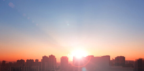 Thanksgiving concept: Bokeh light and blur city skyline sunrise background