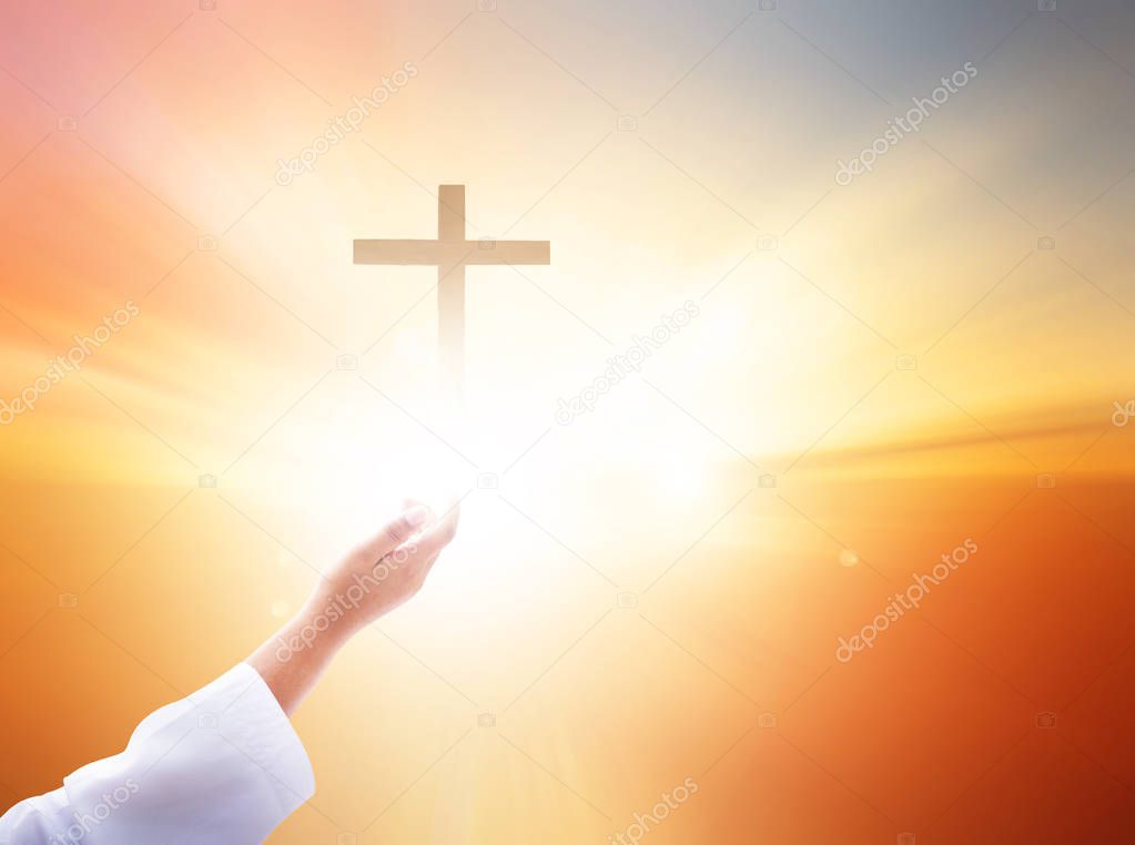 Silhouette of Christian prayers raising hand while praying to the Jesus