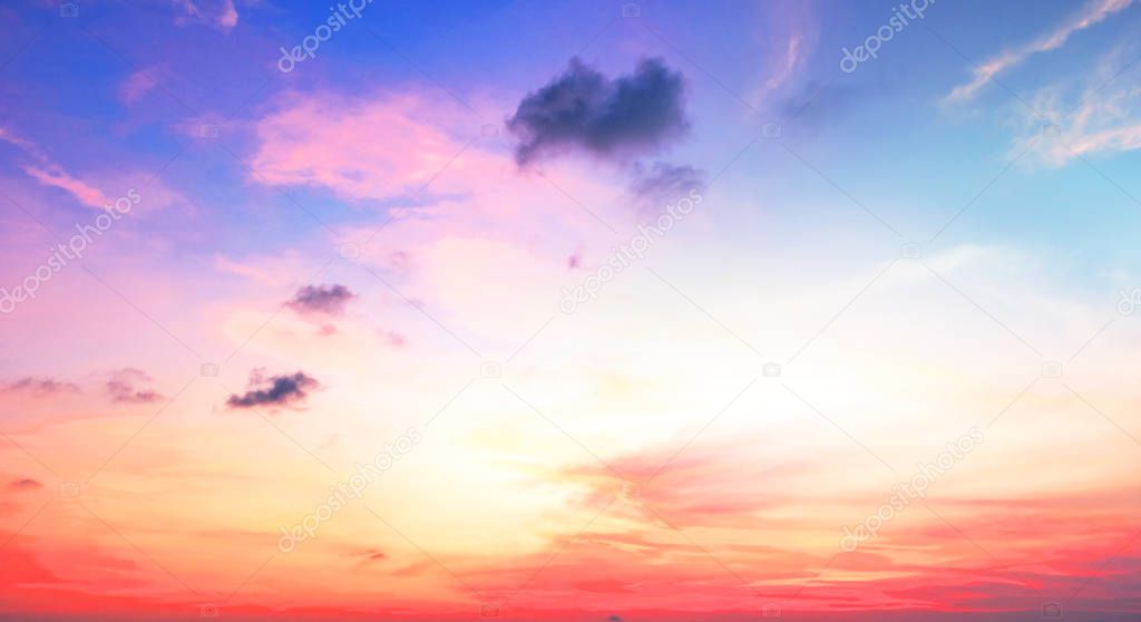 Background of colorful sky concept: Dramatic sunset with twilight color sky and clouds