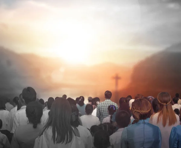 Praise and worship concept:Silhouette of Christian prayers raising hand while praying to the Jesus