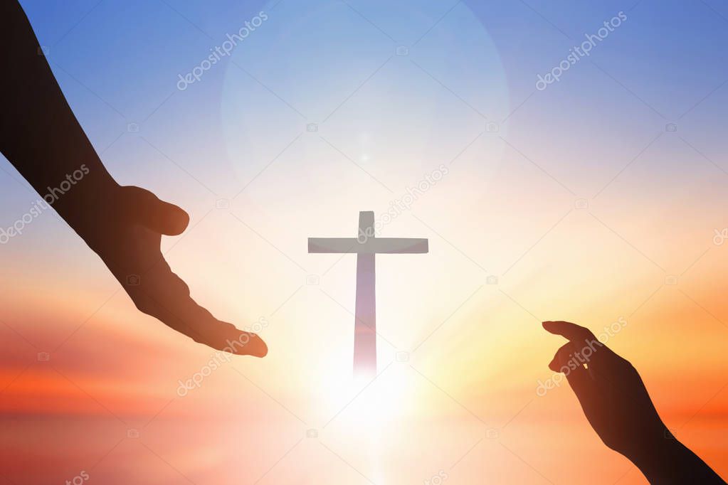 Jesus helping hand conceptWorld Peace Day Help hand on sunset background
