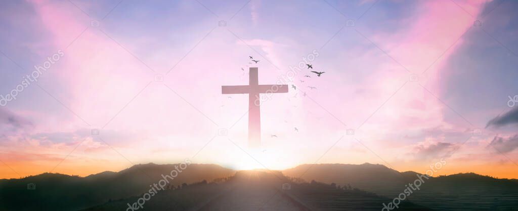 Religious concept: Silhouette cross and birds flying on  sunrise background