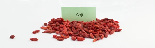 Heap Goji Seeds Isolated White Background Green Describing Label — Stock Photo, Image