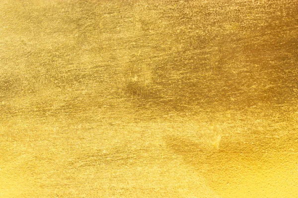 Parlak sarı yaprak altın folyo dokusu arka plan
