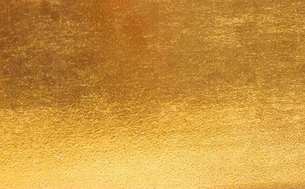 Parlak sarı yaprak altın folyo dokusu arka plan
