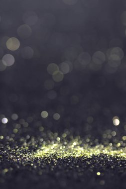 Bokeh glitter sinek ve siyah arka plan ışığı