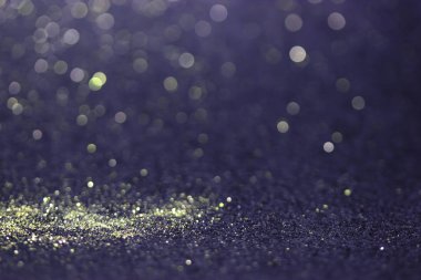 Bokeh glitter sinek ve siyah arka plan ışığı