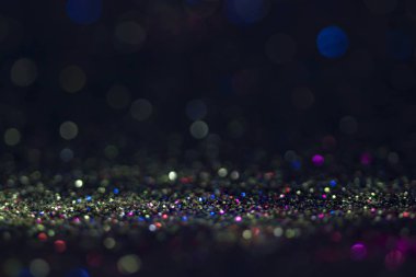 Bokeh glitter sinek ve siyah arka plan ışığı
