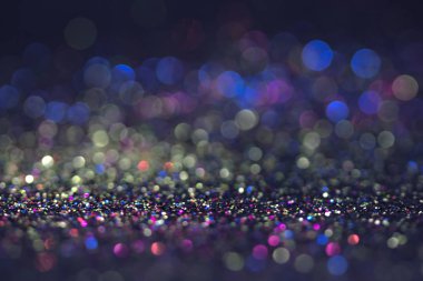 Bokeh glitter sinek ve siyah arka plan ışığı