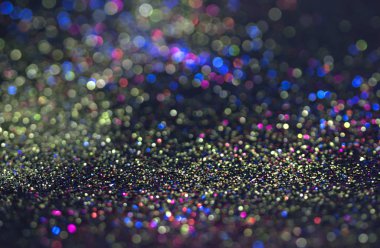 Bokeh glitter sinek ve siyah arka plan ışığı