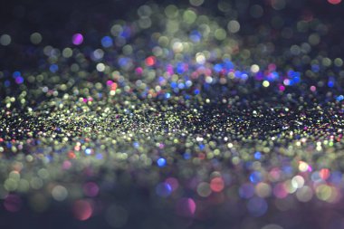 Bokeh glitter sinek ve siyah arka plan ışığı