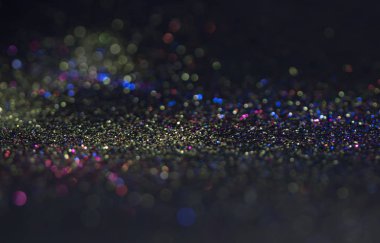 Bokeh glitter sinek ve siyah arka plan ışığı