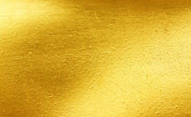 Parlak sarı yaprak altın folyo dokusu arka plan