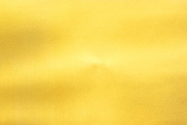 Parlak sarı yaprak altın folyo dokusu arka plan