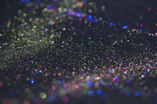 Bokeh glitter sinek ve siyah arka plan ışığı