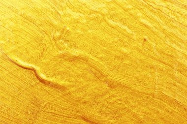 Parlak sarı yaprak altın folyo dokusu arka plan