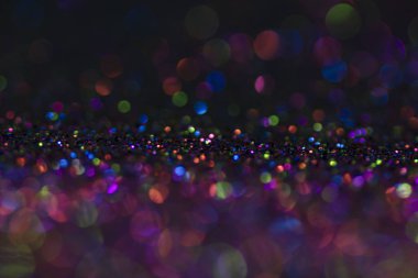 Bokeh glitter sinek ve siyah arka plan ışığı