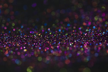 Bokeh glitter sinek ve siyah arka plan ışığı