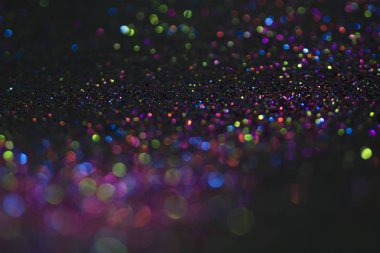 Bokeh glitter sinek ve siyah arka plan ışığı