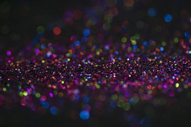 Bokeh glitter sinek ve siyah arka plan ışığı
