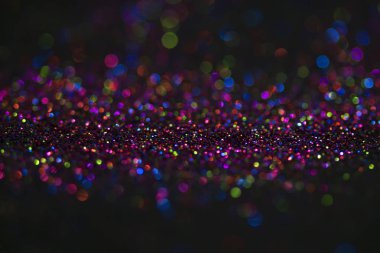 Bokeh glitter sinek ve siyah arka plan ışığı