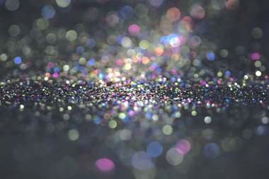Bokeh glitter sinek ve siyah arka plan ışığı